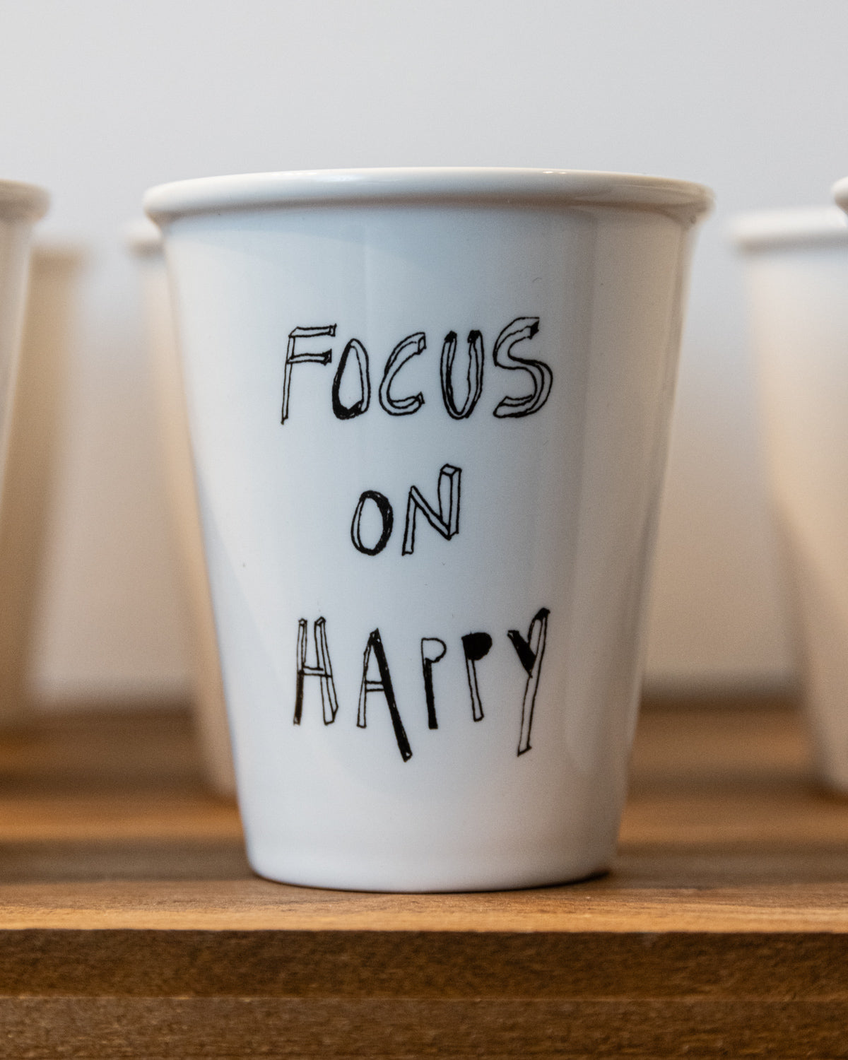 Helen B Becher - cup focus on happy